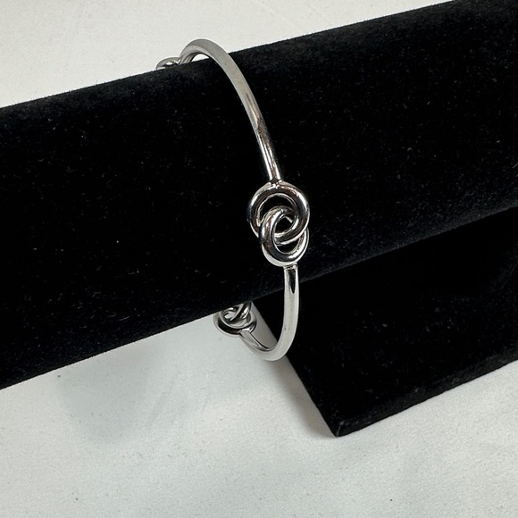 Jewelry - Elegant Silver Tone Knot Bracelet